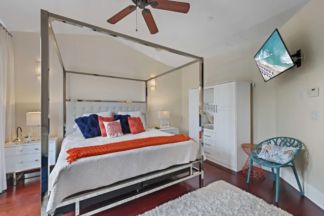 a bed room with a bed and a lamp