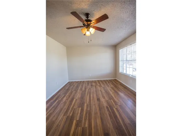 a view of backyard of the house