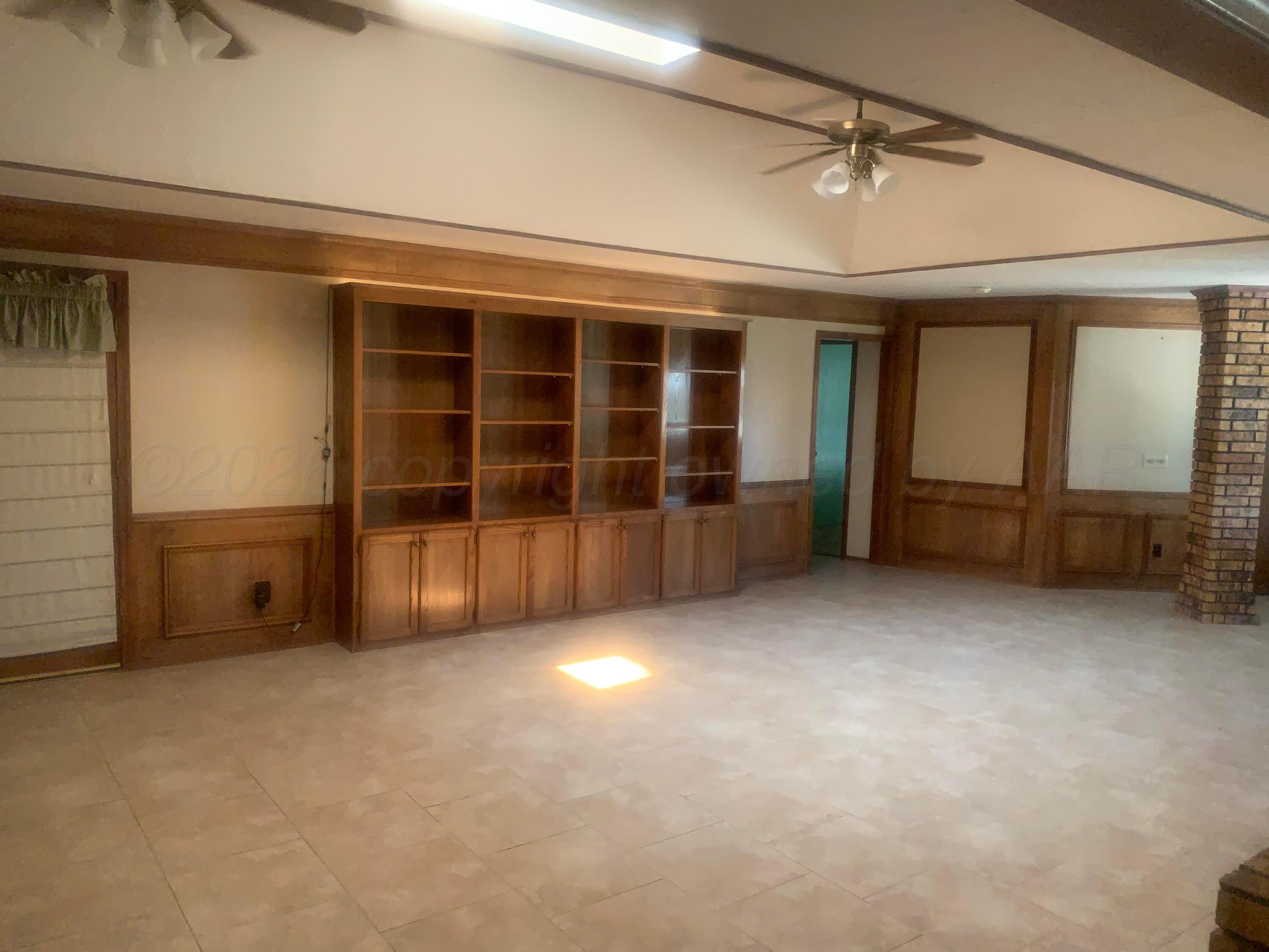 6101 Ridgewood Drive Amarillo, TX 79109 - Photo 14 of 28 an empty room with windows