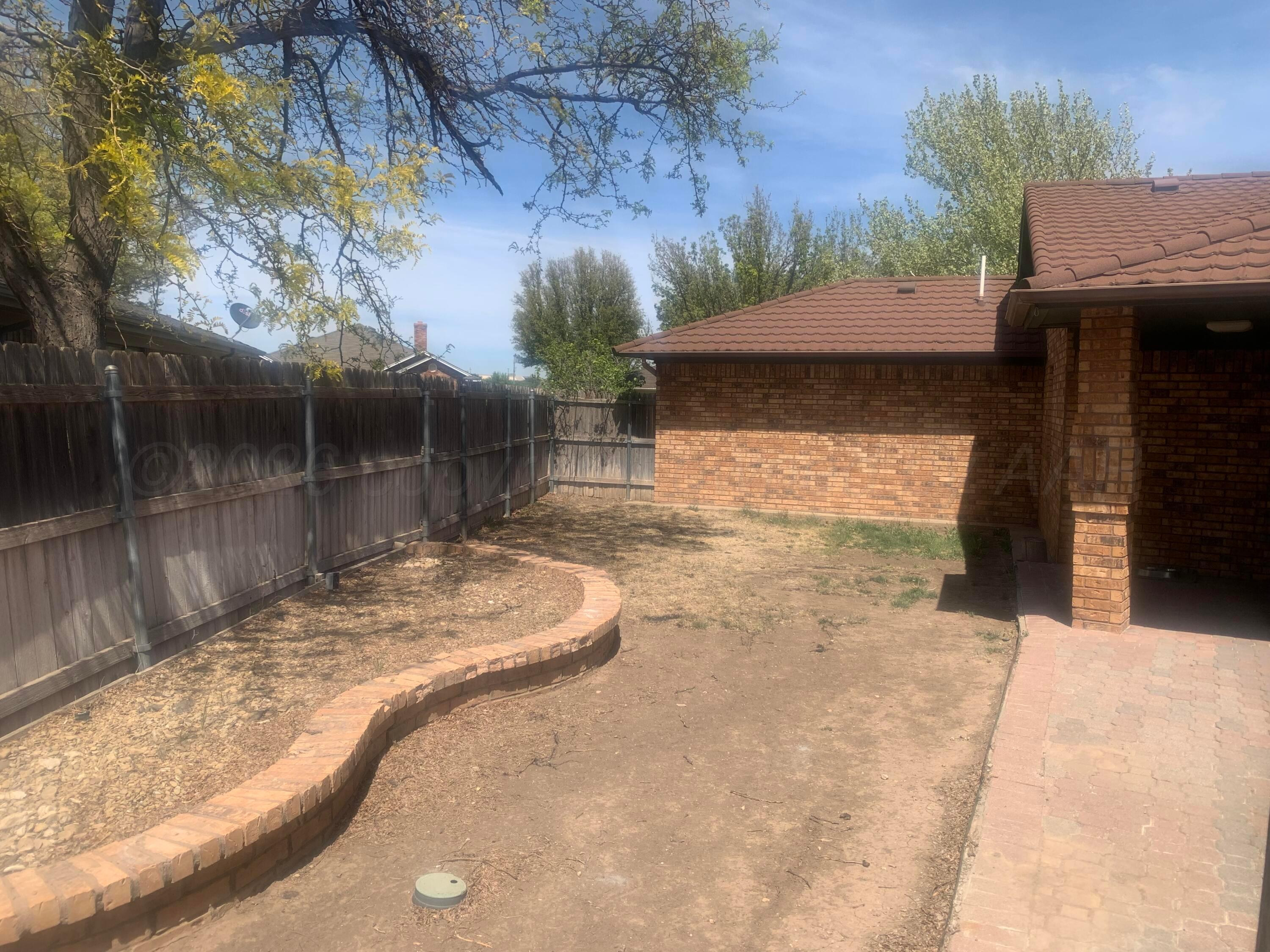 6101 Ridgewood Drive Amarillo, TX 79109 - Photo 23 of 28 a view of a backyard