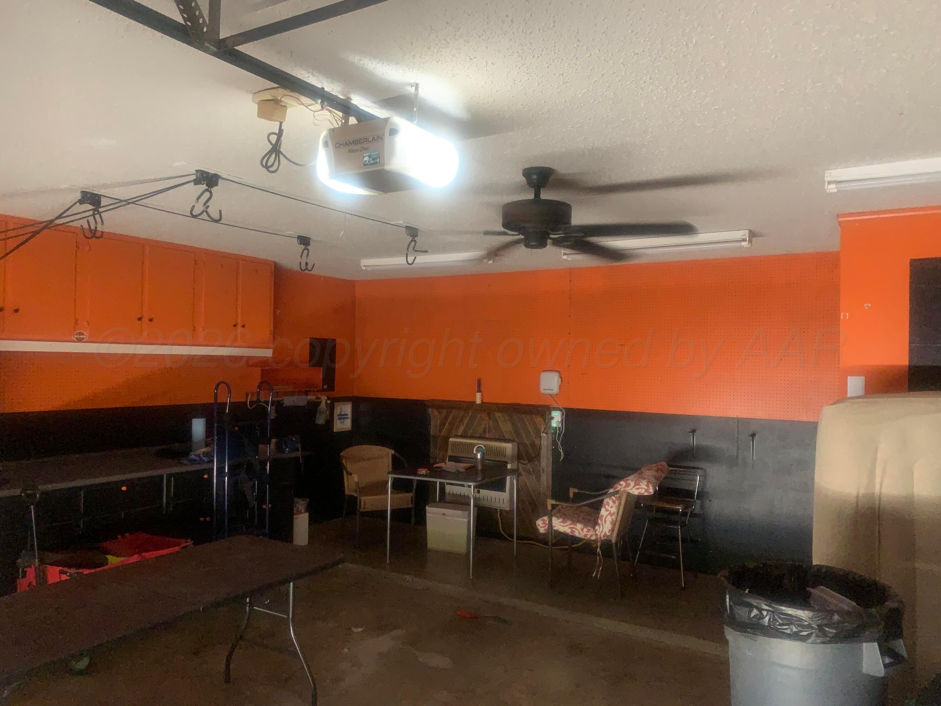 6101 Ridgewood Drive Amarillo, TX 79109 - Photo 24 of 28 a view of a patio with dining table and chairs