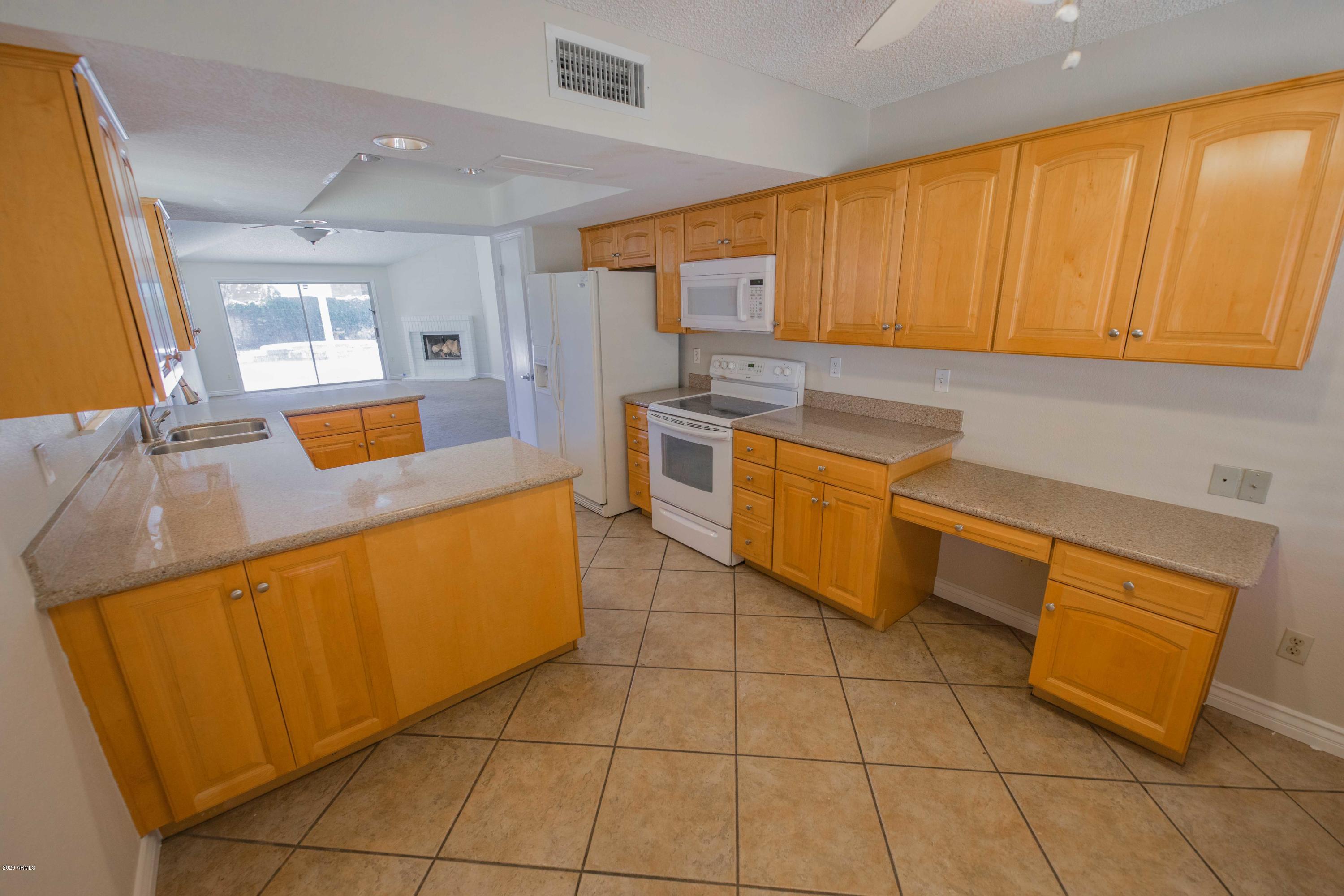 1833 East Hearn Road Phoenix, AZ 85022 - Photo 7 of 23 1833_E_Hearn_Rd_kitchen_(1_of_1)