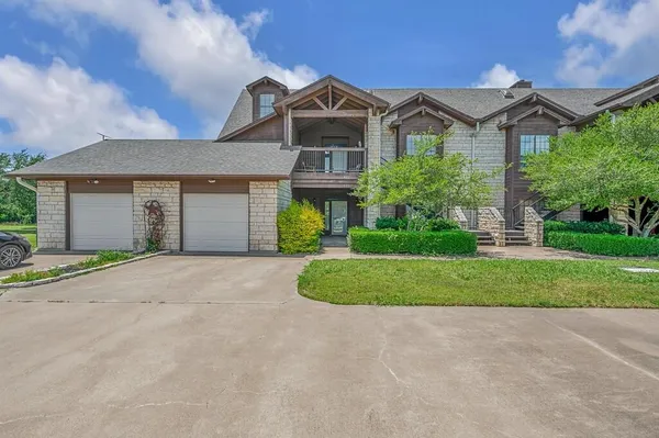 $315,000 | 27095 Meadowmore Court, Unit 402, Whitney, TX 76692