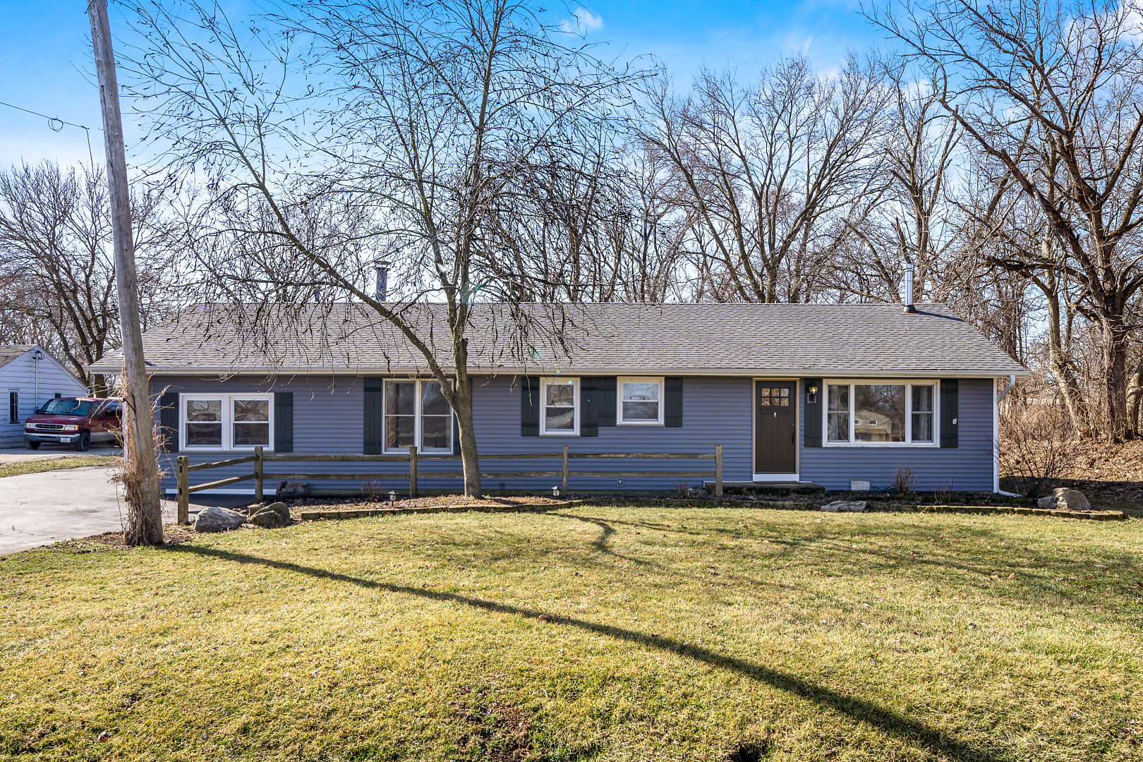 86 Bristol Ridge Road Bristol, IL 60512 - Photo 1 of 41 a view of a house with a yard covered in snow