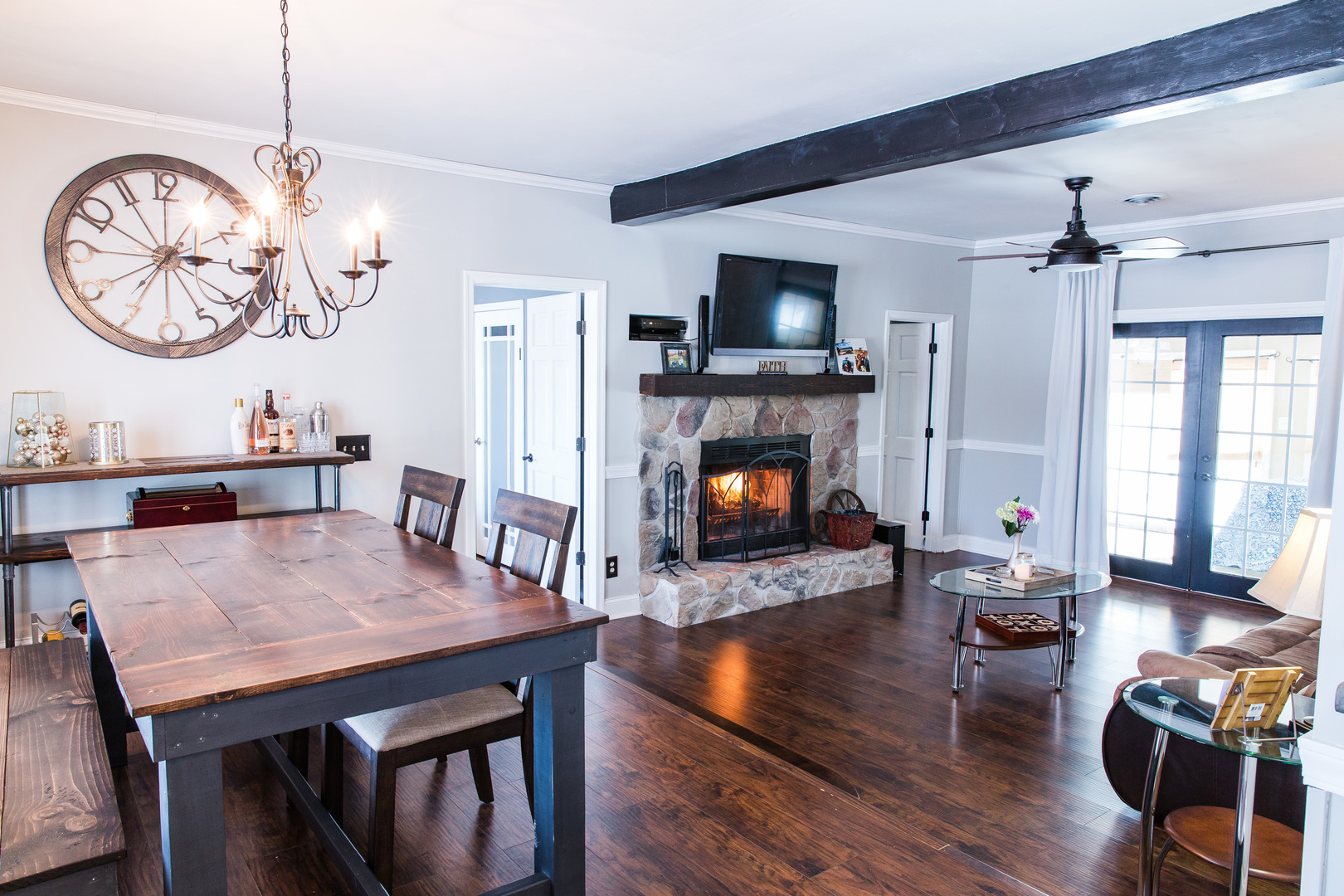 86 Bristol Ridge Road Bristol, IL 60512 - Photo 13 of 41 a view of a dining room with furniture a fireplace and wooden floor