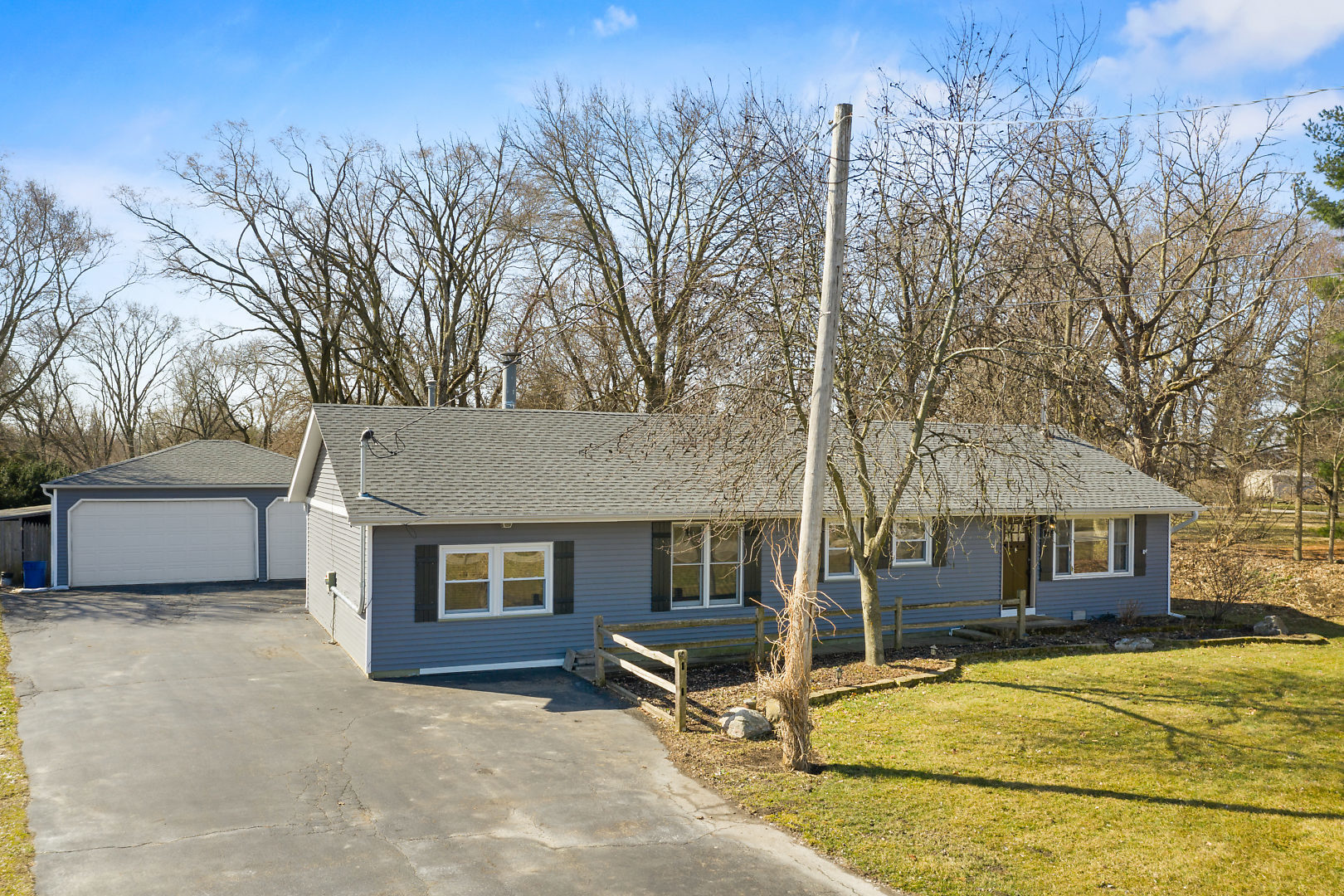 86 Bristol Ridge Road Bristol, IL 60512 - Photo 3 of 41 a view of house with yard and trees in the background