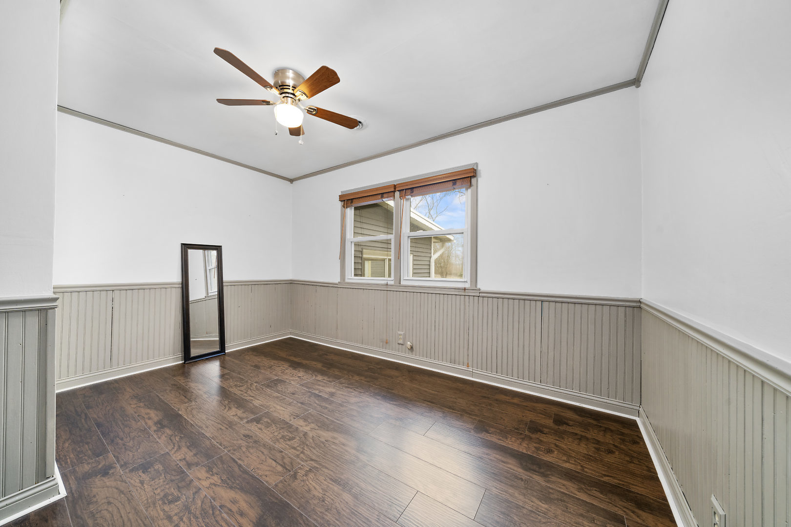 86 Bristol Ridge Road Bristol, IL 60512 - Photo 25 of 41 wooden floor in an empty room with a window