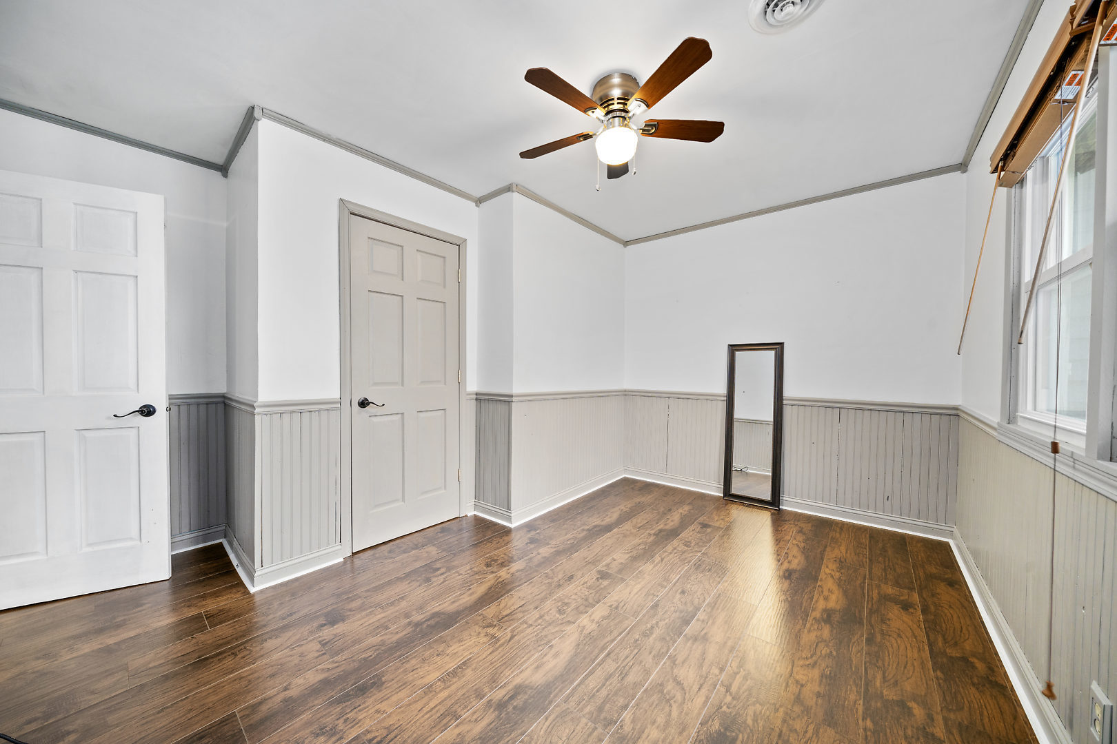 86 Bristol Ridge Road Bristol, IL 60512 - Photo 26 of 41 wooden floor in an empty room with a window