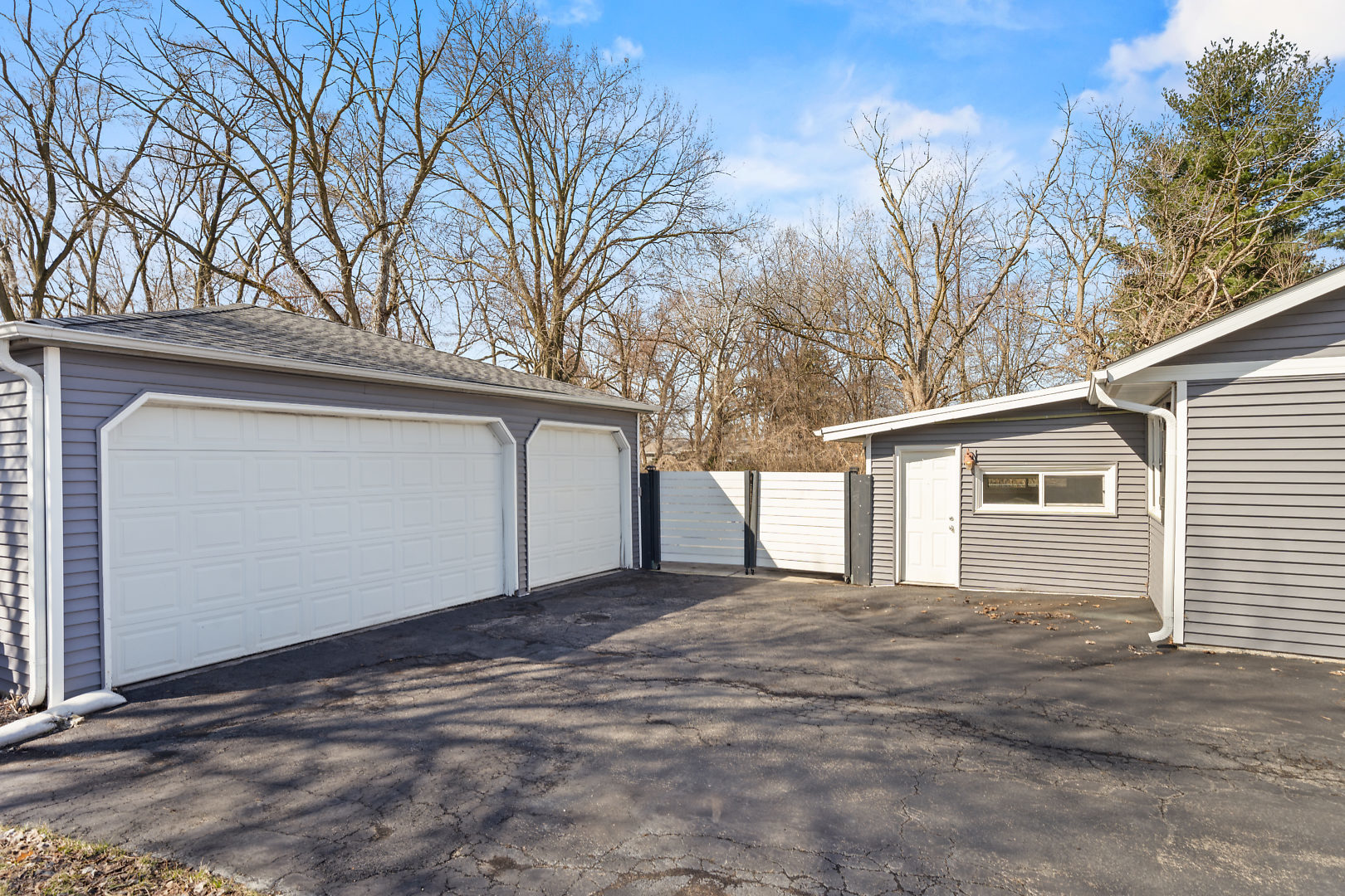 86 Bristol Ridge Road Bristol, IL 60512 - Photo 28 of 41 a view of a house with a big yard and large tree