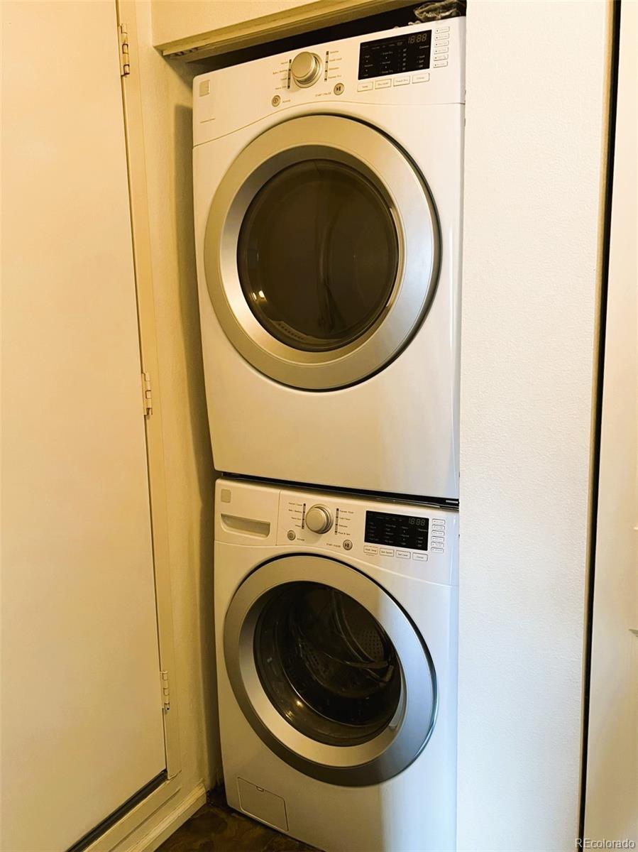 8488 Everett Way, Unit A Arvada, CO 80005 - Photo 22 of 27 a utility room with dryer and washer