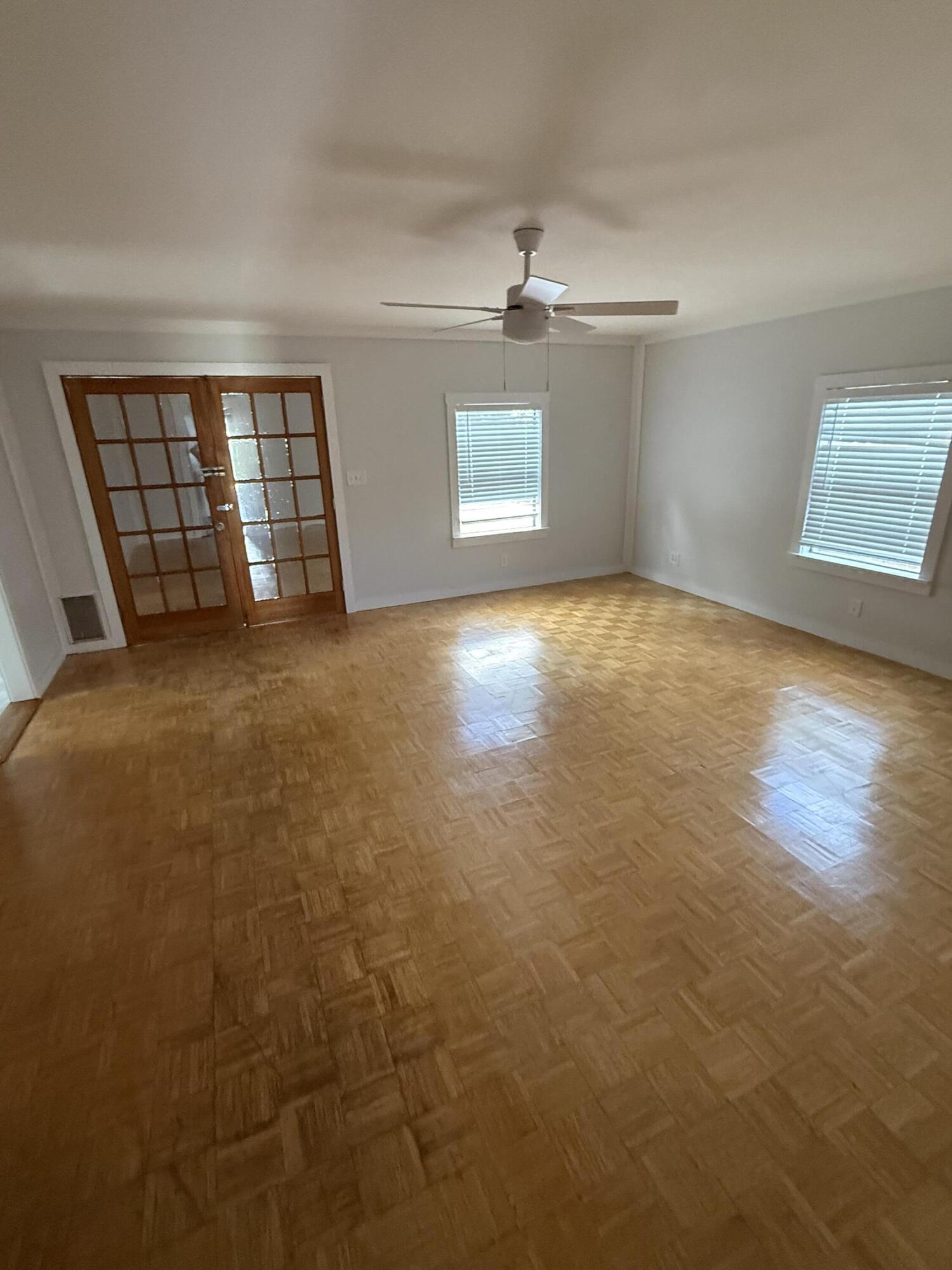 3611 Elizabeth Street Palm Springs, FL 33461 - Photo 12 of 19 an empty room with windows