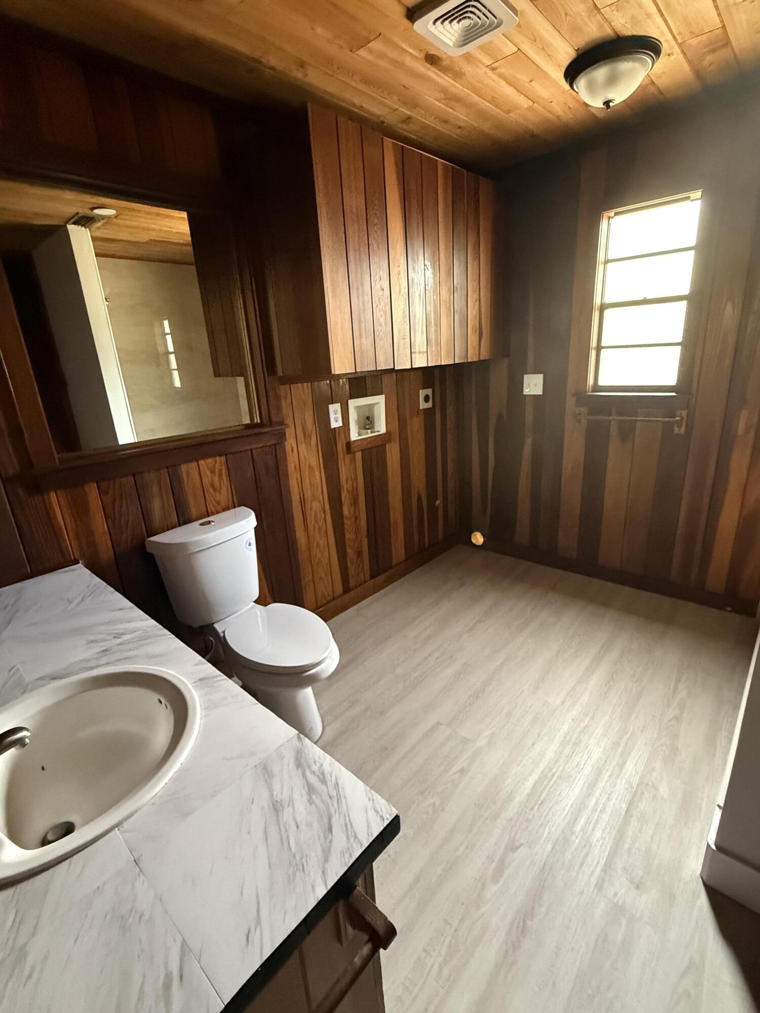 3611 Elizabeth Street Palm Springs, FL 33461 - Photo 14 of 19 a dining room with furniture and window