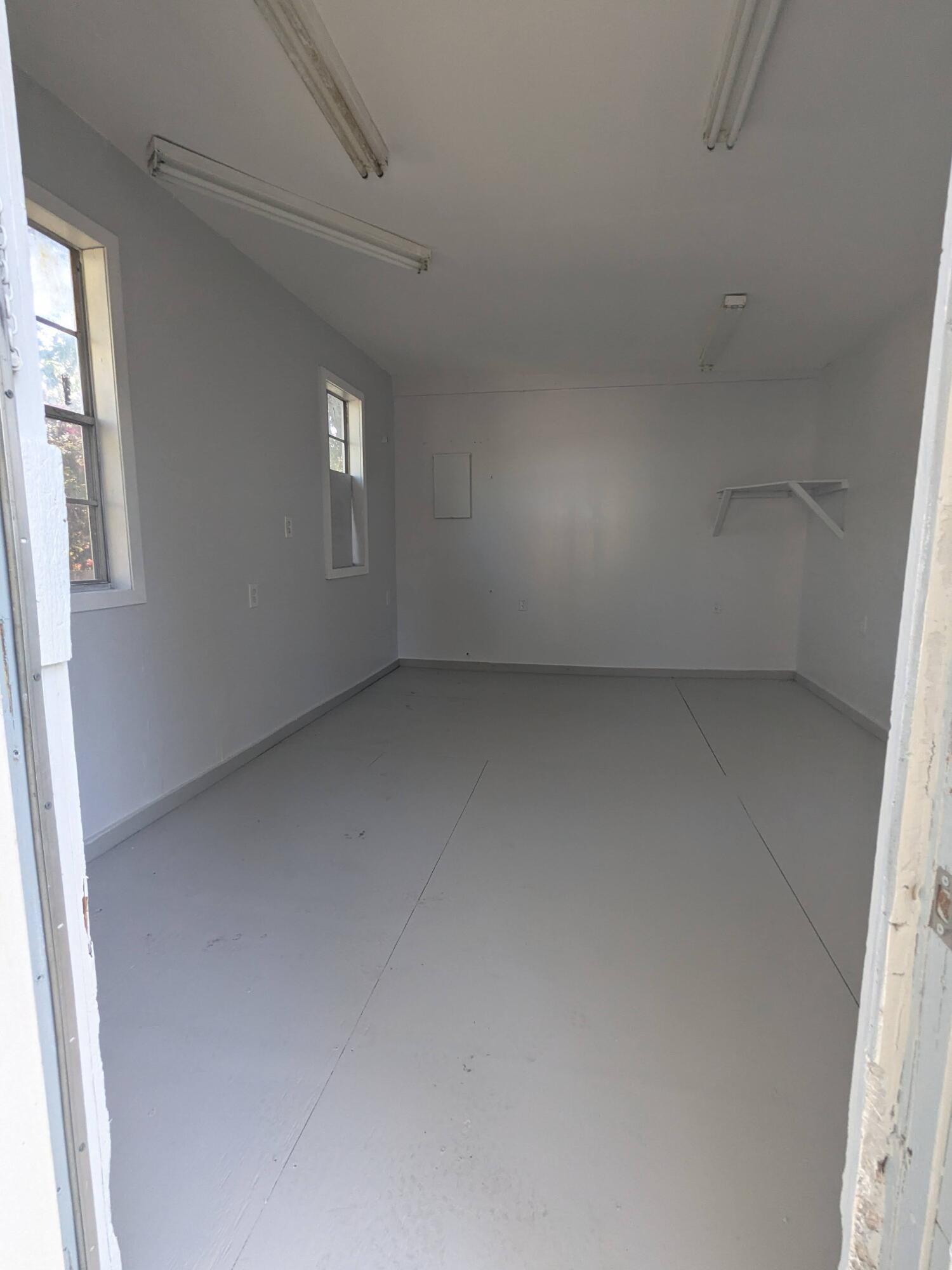 3611 Elizabeth Street Palm Springs, FL 33461 - Photo 17 of 19 a view of an empty room with a window