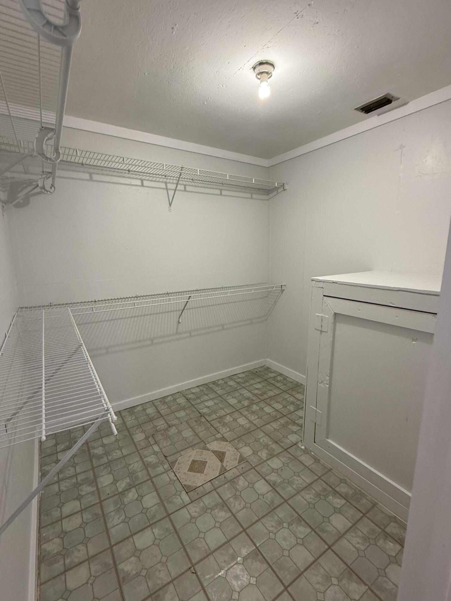 3611 Elizabeth Street Palm Springs, FL 33461 - Photo 9 of 19 a bathroom with a shower