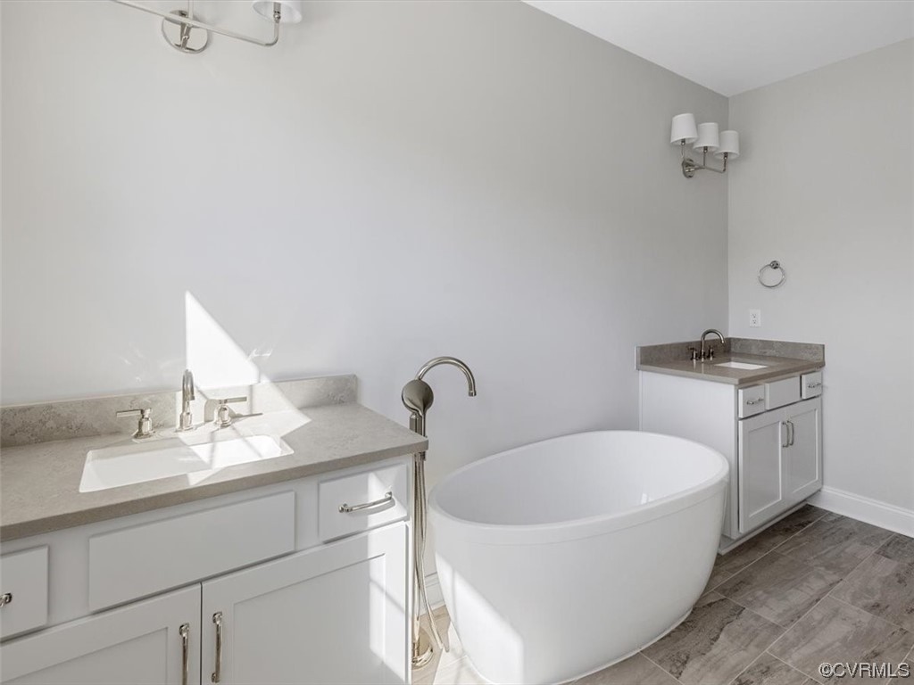 10708 River Fall Path Glen Allen, VA 23059 - Photo 29 of 35 a bathroom with a sink and a bathtub
