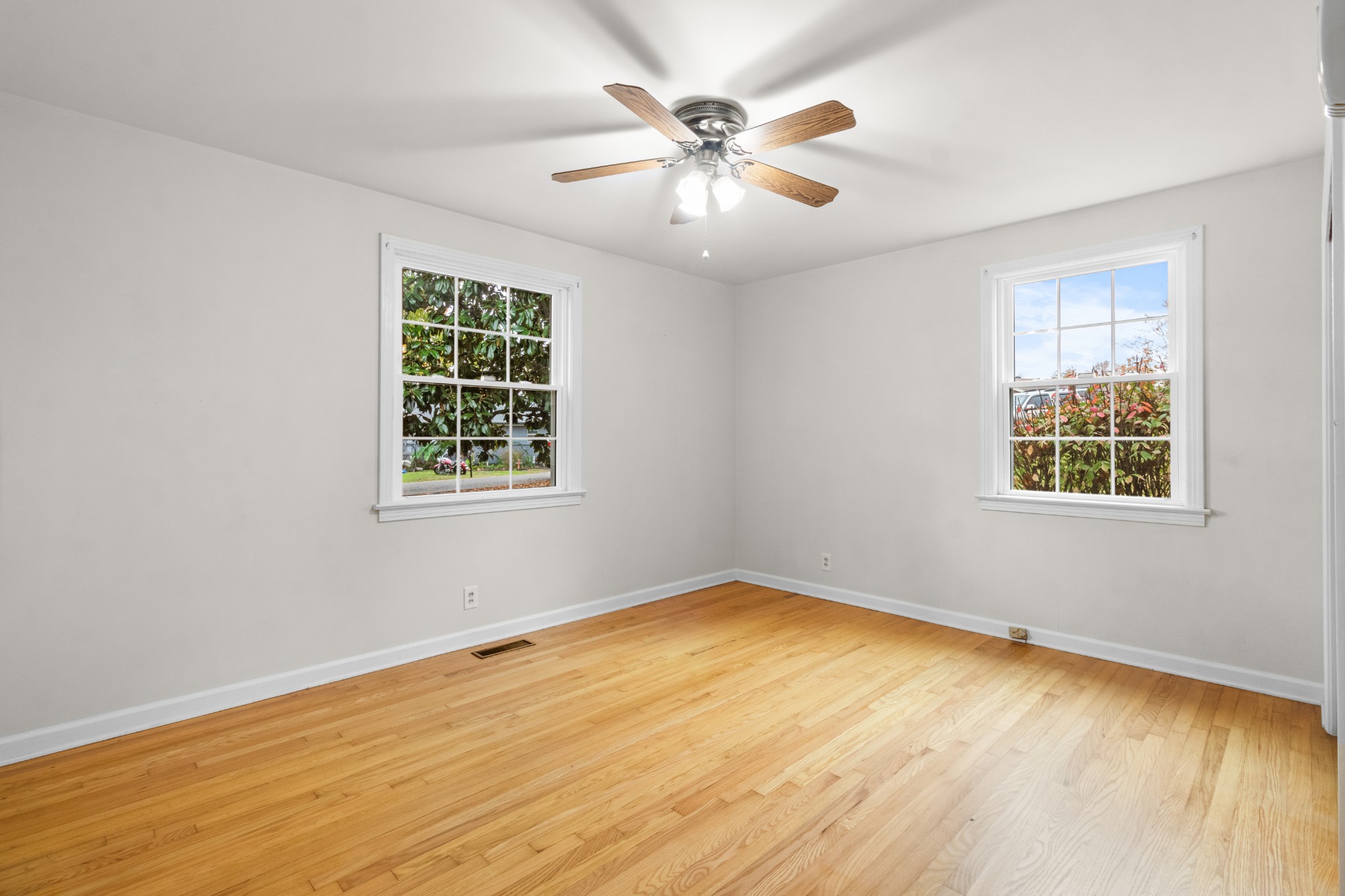 2007 Post Road Clarksville, TN 37043 - Photo 28 of 29 wooden floor in an empty room with a window