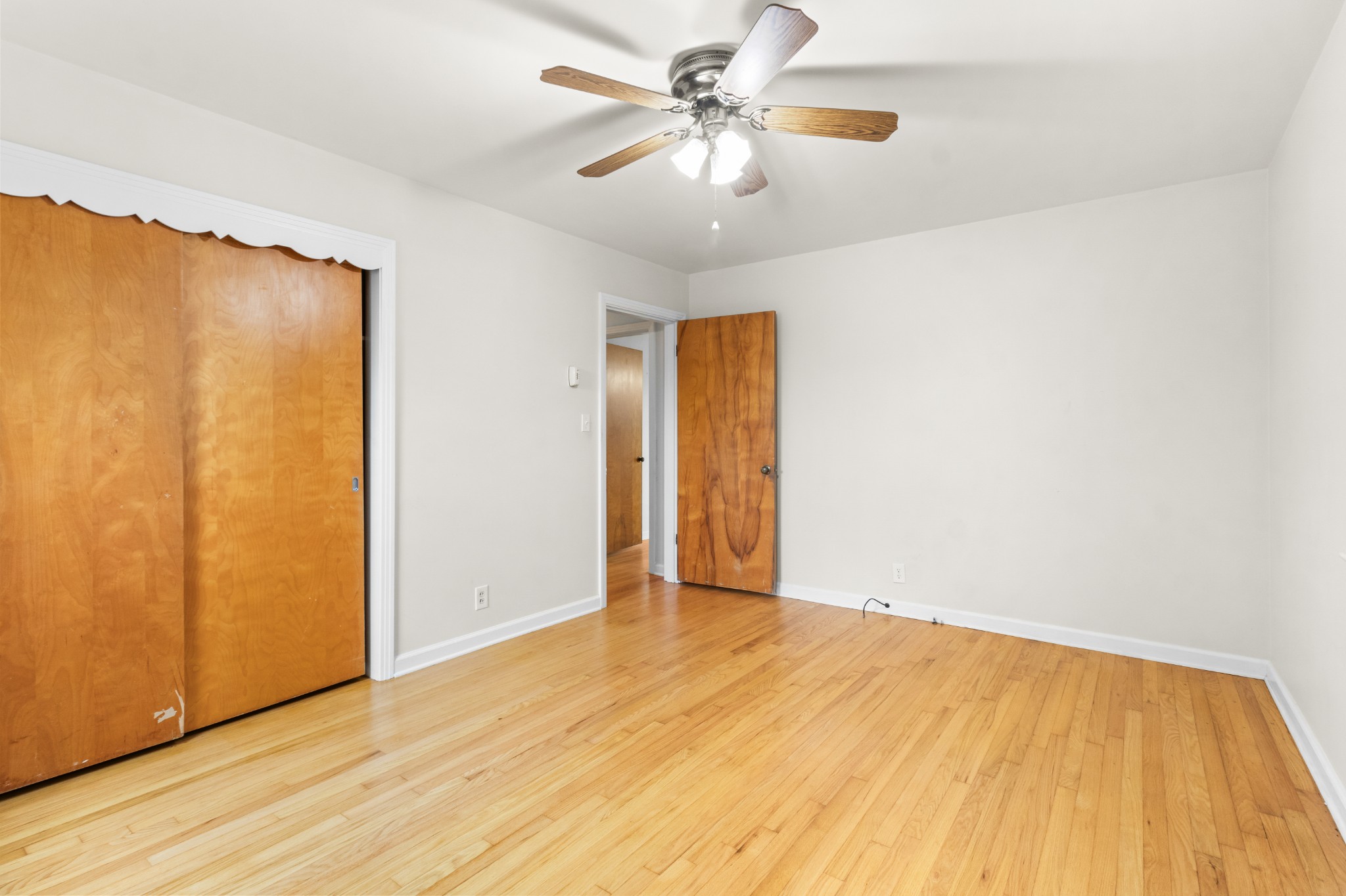 2007 Post Road Clarksville, TN 37043 - Photo 29 of 29 a view of a big room with wooden floor and a ceiling fan