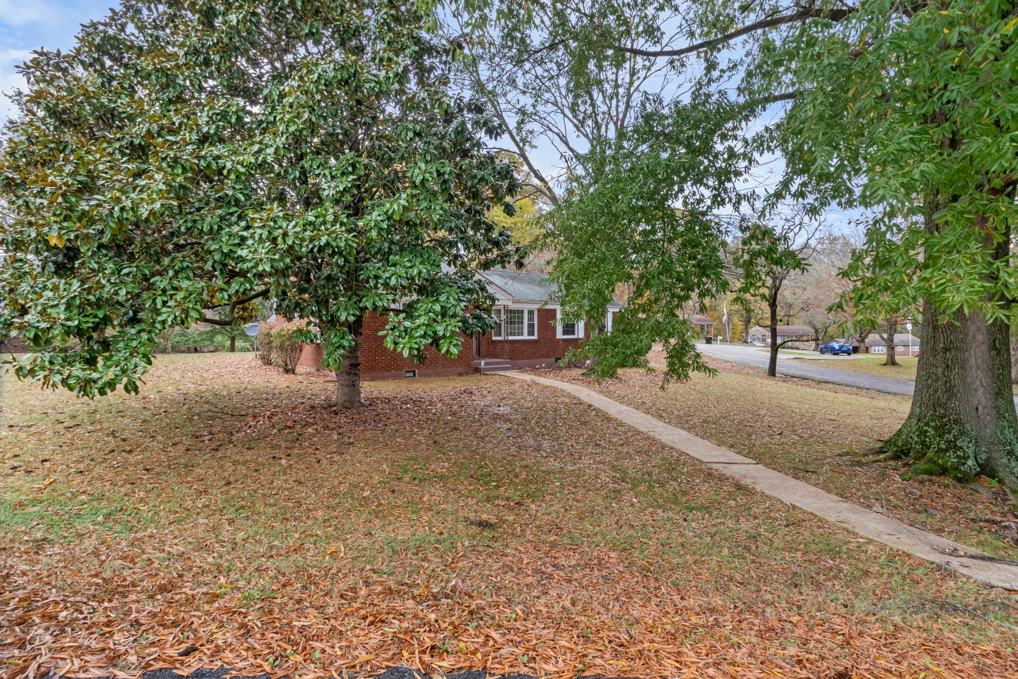 2007 Post Road Clarksville, TN 37043 - Photo 3 of 29 a view of road with trees and bushes