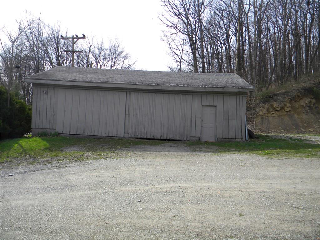 664 County Line Road Acme, PA 15610 - Photo 16 of 24 This fantastic garage is ready for all your storage and shop needs.