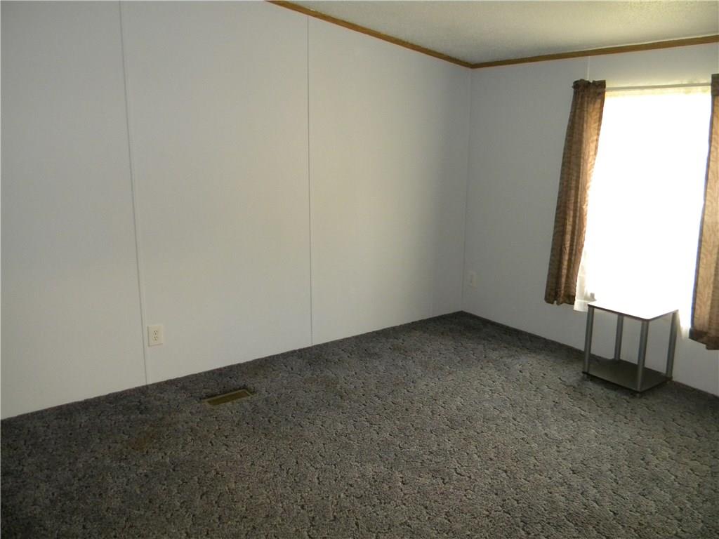 664 County Line Road Acme, PA 15610 - Photo 9 of 24 Nice sized bedroom with blue walls.
