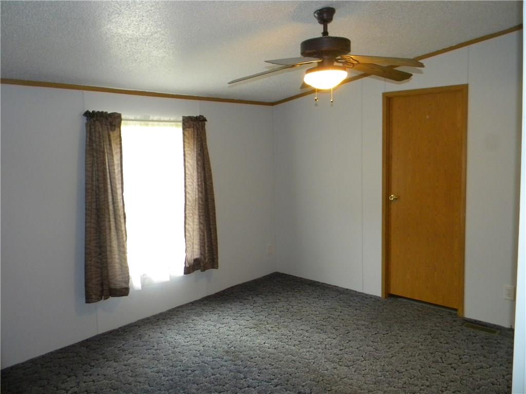 664 County Line Road Acme, PA 15610 - Photo 10 of 24 Enjoyable sized bedroom with a nice big ceiling fan.