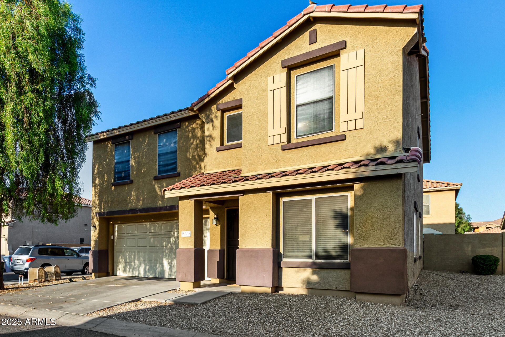 9415 West Eaton Road Phoenix, AZ 85037 - Photo 6 of 36 a front view of a house