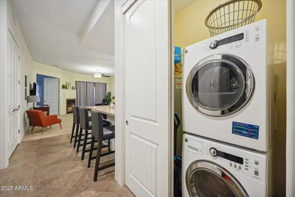 a view of a hallway with washer and dryer