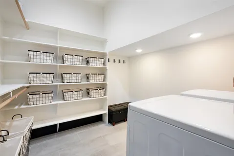 a room with a bed and furniture