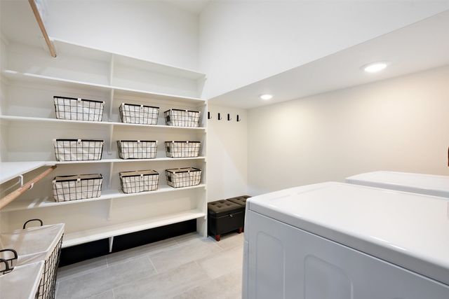 a room with a bed and furniture