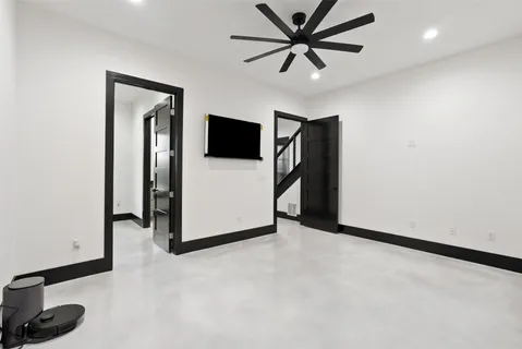 a view of a livingroom with a flat screen tv