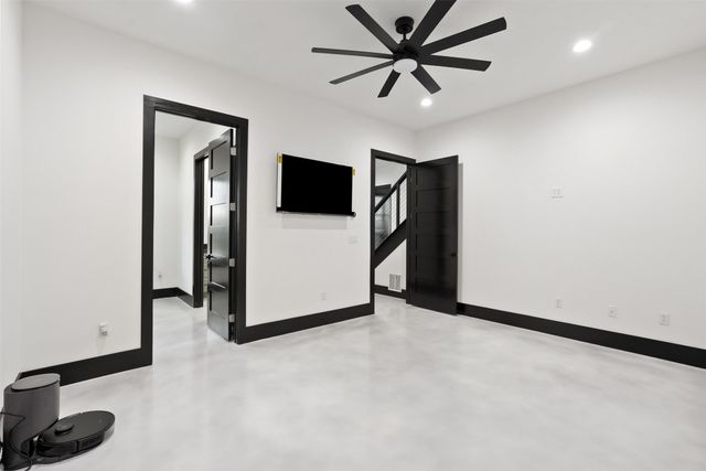 a view of a livingroom with a flat screen tv