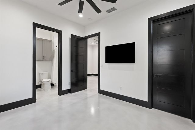 a view of a livingroom with a flat screen tv