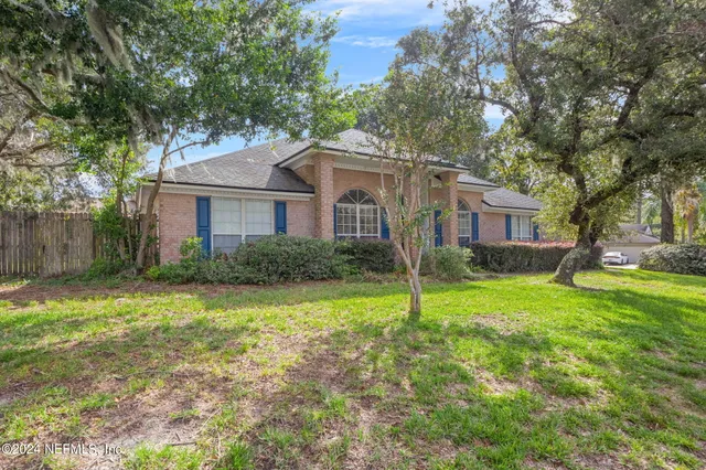 a house view with a garden space