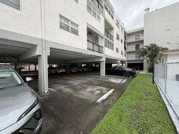 a view of a street with cars