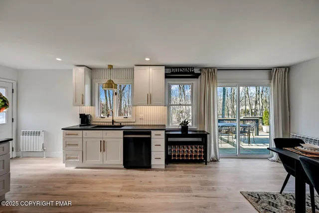 a view of living room and utility room