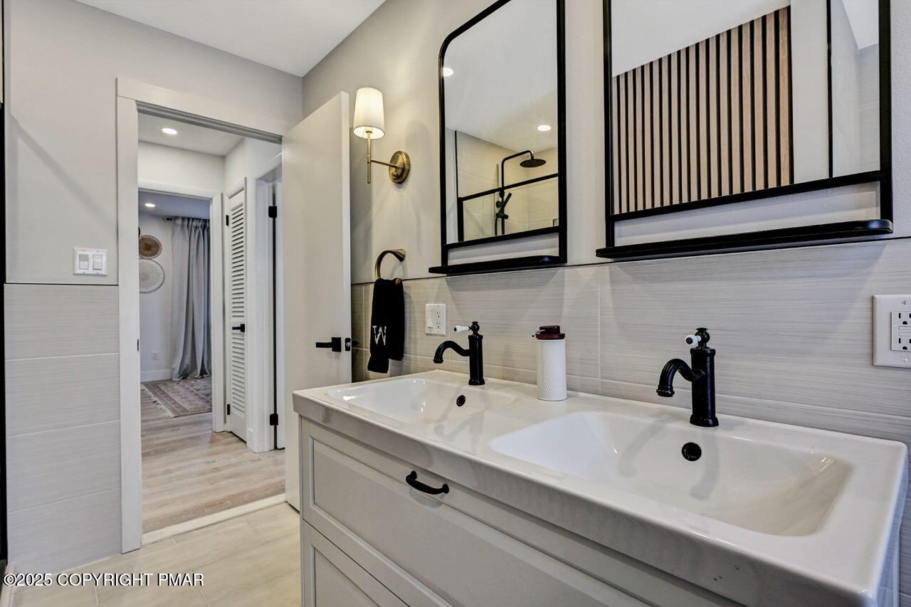 205 Winona Road Mount Pocono, PA 18344 - Photo 26 of 47 a bathroom with a sink and mirror