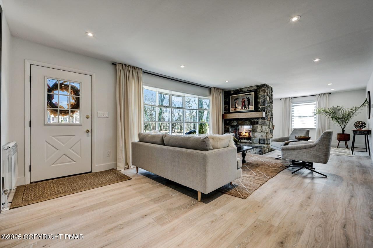 205 Winona Road Mount Pocono, PA 18344 - Photo 4 of 47 a living room with furniture and a window