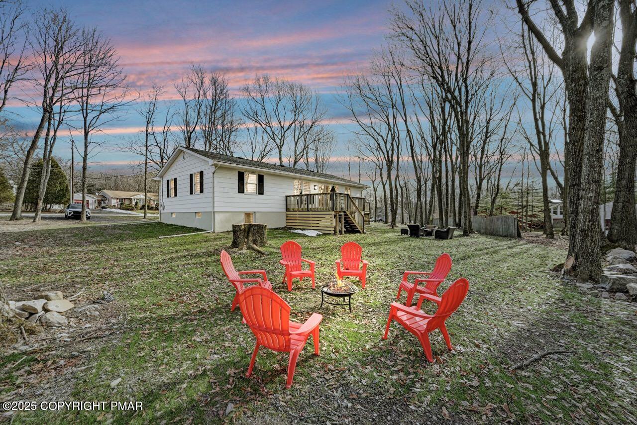 205 Winona Road Mount Pocono, PA 18344 - Photo 47 of 47 a view of a small sitting area with the trees