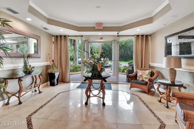 a utility room with cabinets washer and dryer