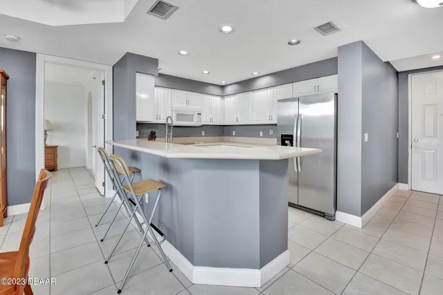 a bathroom with a toilet a sink and a mirror