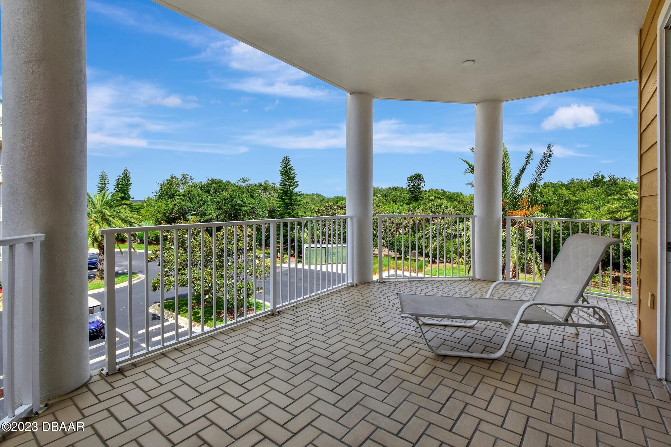 4623 Rivers Edge Village Lane, Unit 6308 Ponce Inlet, FL 32127 - Photo 30 of 55 a building outdoor space with seating space