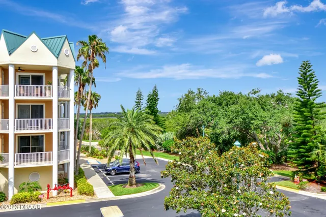 a bedroom with a bed and cabinets