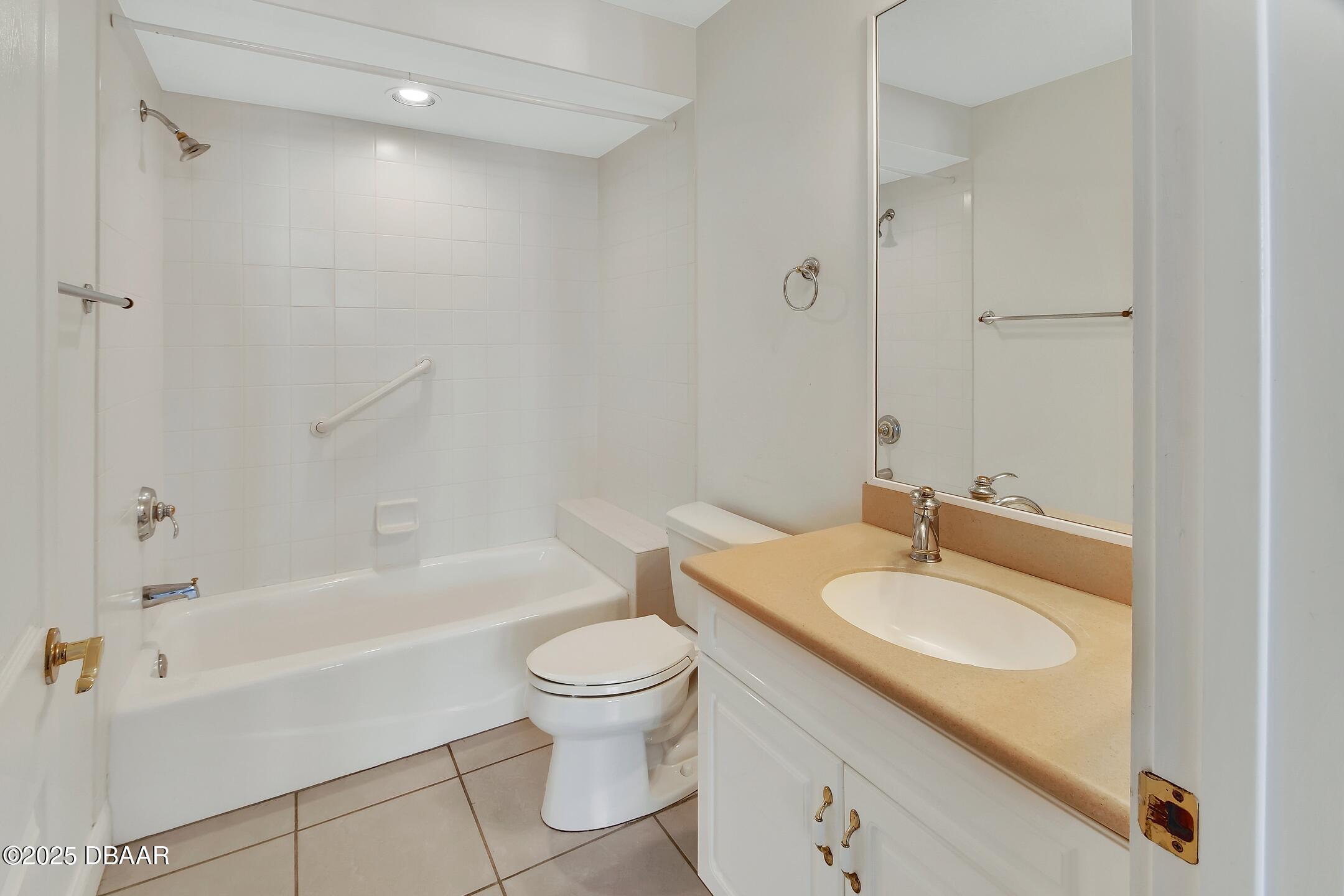4623 Rivers Edge Village Lane, Unit 6308 Ponce Inlet, FL 32127 - Photo 41 of 55 a bathroom with a sink toilet and shower