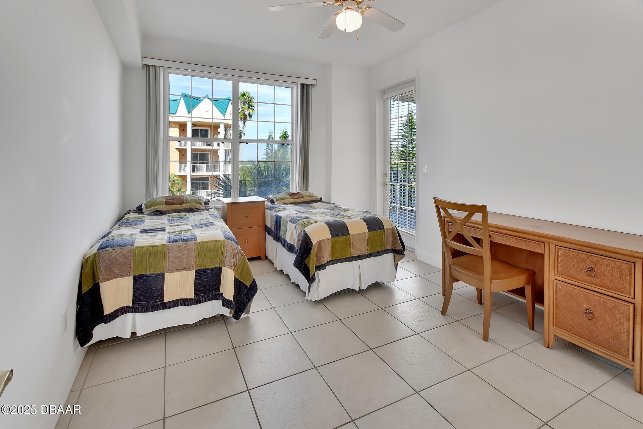 4623 Rivers Edge Village Lane, Unit 6308 Ponce Inlet, FL 32127 - Photo 42 of 55 a bedroom with furniture and a window