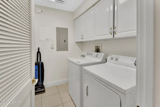 a front view of house with yard and outdoor seating