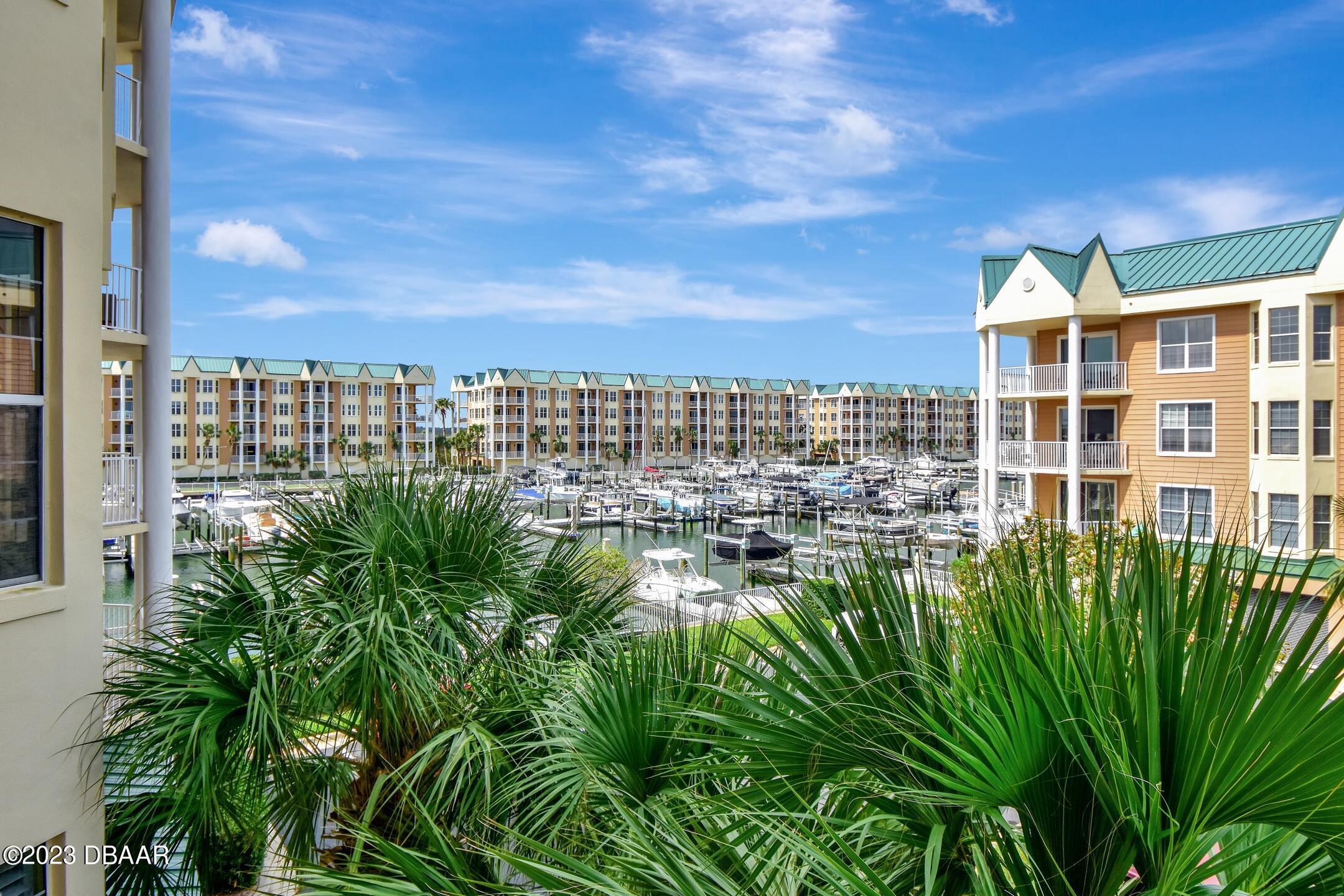 4623 Rivers Edge Village Lane, Unit 6308 Ponce Inlet, FL 32127 - Photo 8 of 55 a view of a city with tall buildings