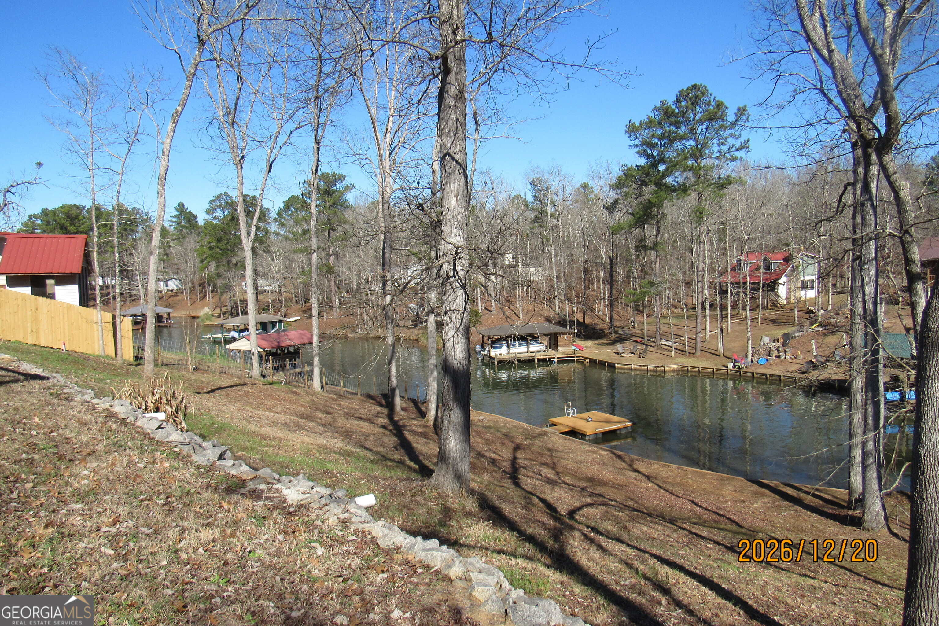 98 Lookout Trail Sparta, GA 31087 - Photo 2 of 10 a view of a lake with boats and trees