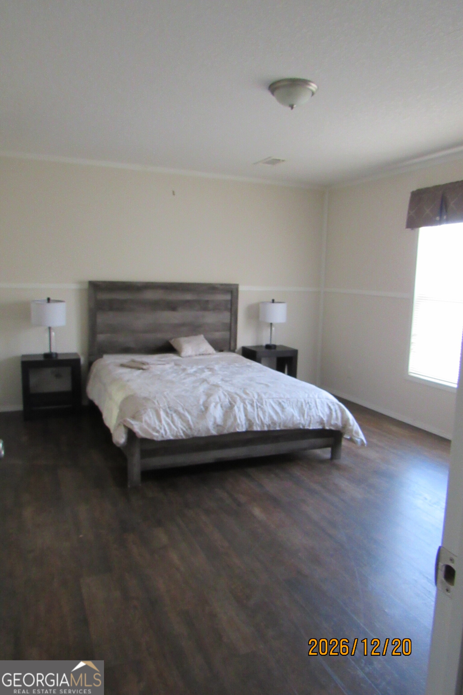 98 Lookout Trail Sparta, GA 31087 - Photo 7 of 10 a bedroom with a bed and window