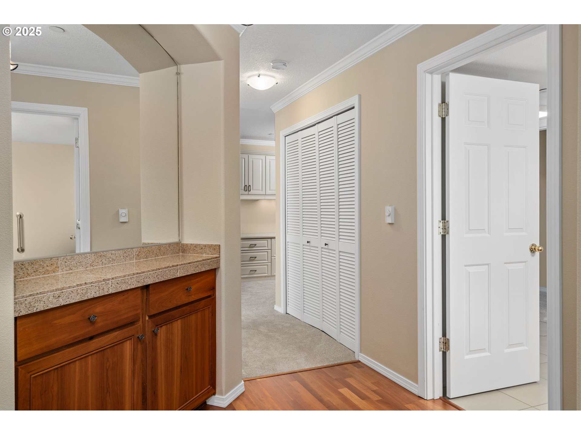 30406 Southwest Ruth Street, Unit 78 Wilsonville, OR 97070 - Photo 15 of 45 a view of cabinets with wooden floor