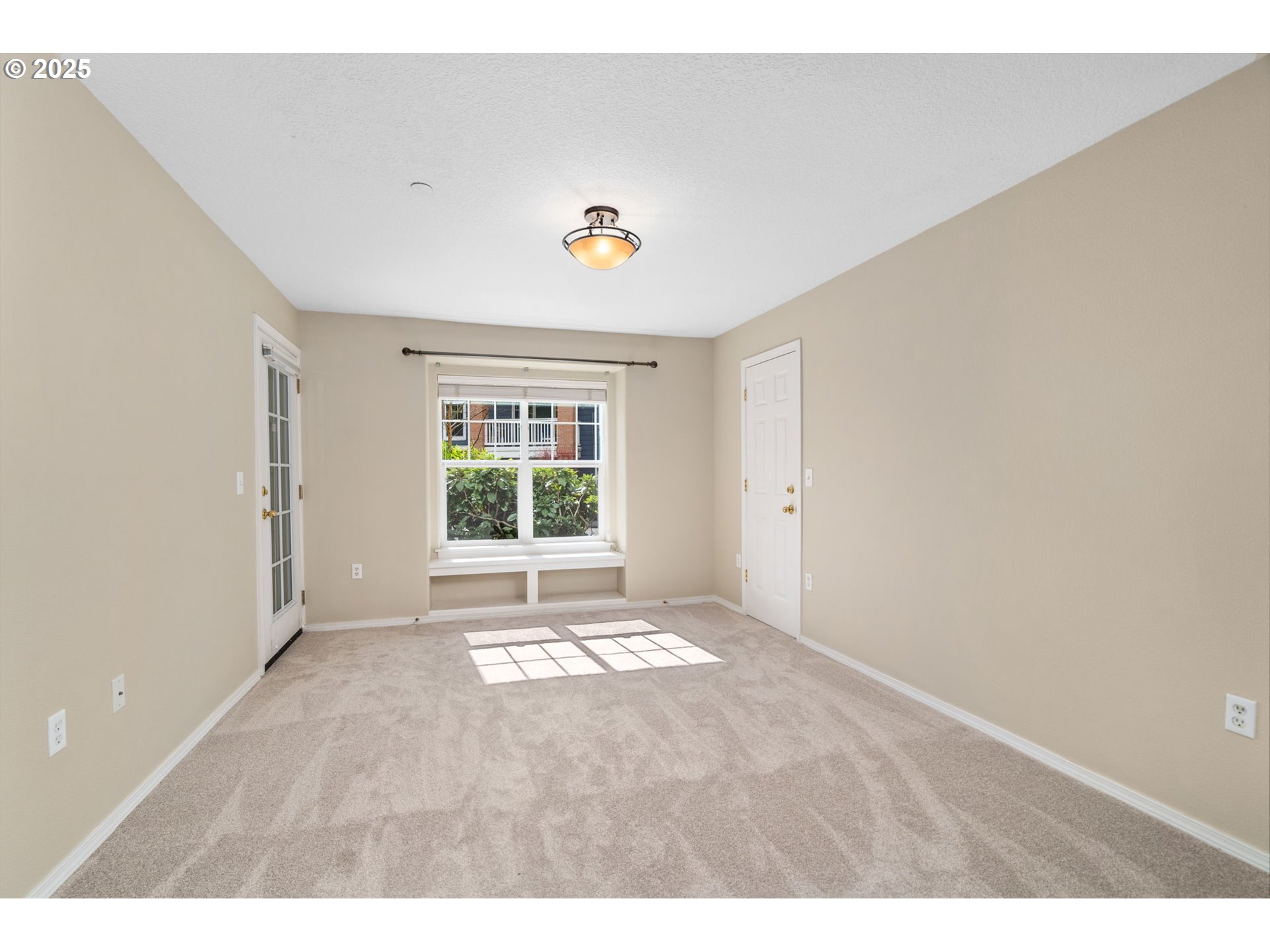 30406 Southwest Ruth Street, Unit 78 Wilsonville, OR 97070 - Photo 16 of 45 a view of an empty room with a window